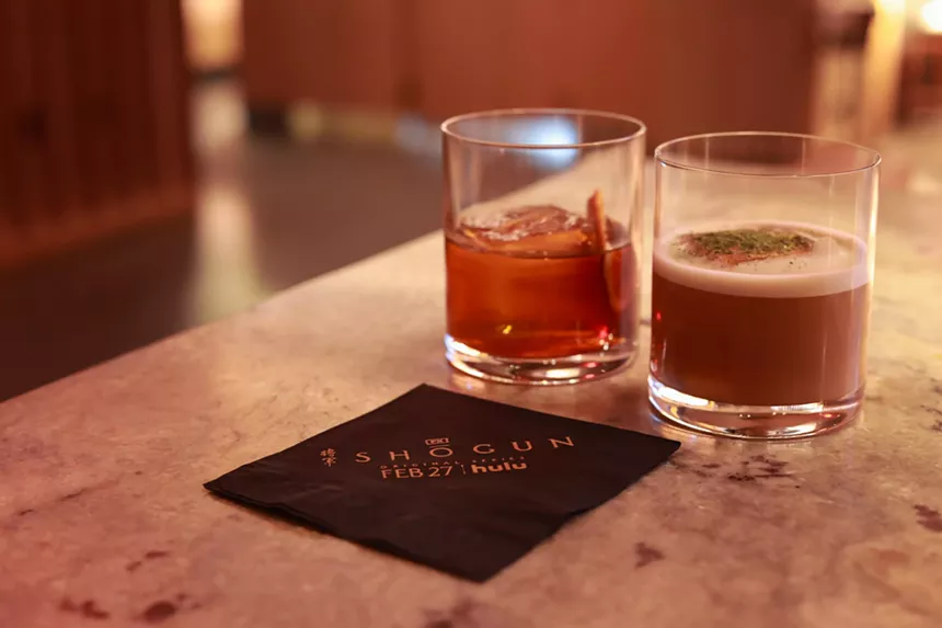 Cocktails and a napkin on a table