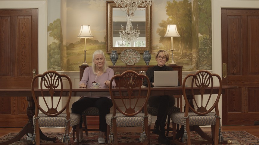 Actresses Diane Ladd and Mary Stuart Masterson sitting at a table in a scene in "Isle of Hope"