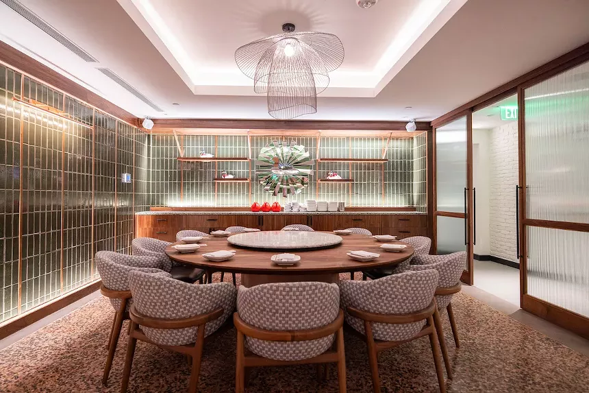 A dining room with a chandelier