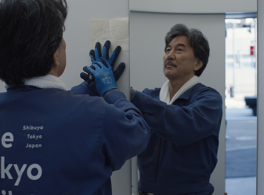 Koji Yakusho cleaning a mirror in the film Perfect Days