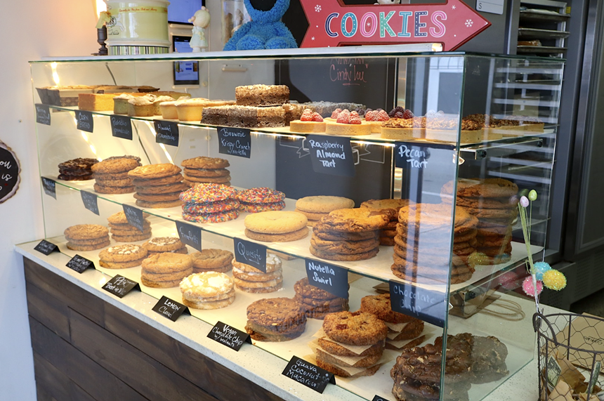 Rows of cookies on display in a display counter