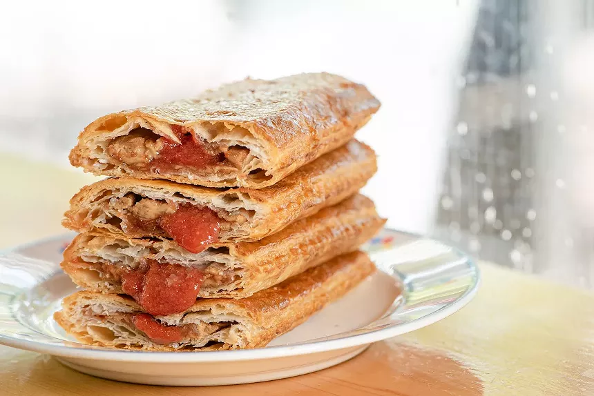 a pile of pastelitos