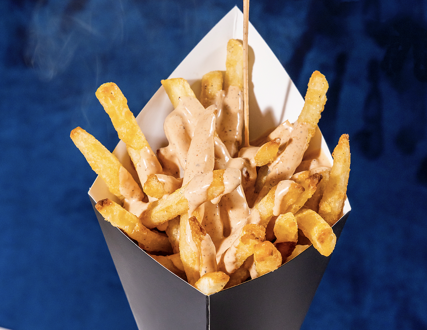 French fries and a blue background