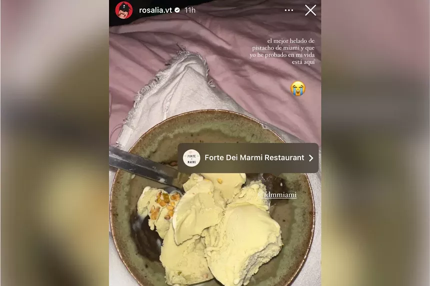 A bowl of pistachio ice cream on a pillow