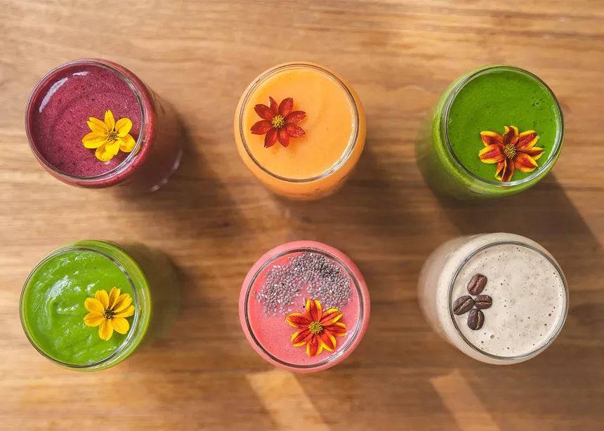 Colorful drinks on a wooden table