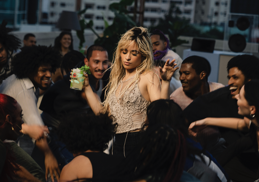A woman dancing in a crowd