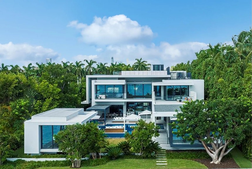 a real estate listing photo showing the rebuilt property at 27 Star Island in Miami Beach