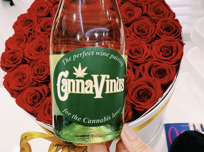 A wine bottle and roses