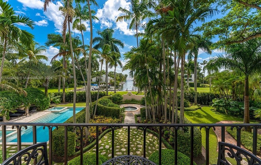 View of a short, narrow cut out to Biscayne Bay from a Coconut Grove mansion
