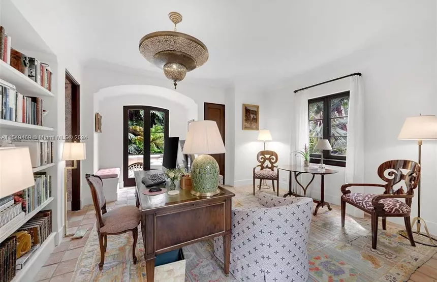 contemporary photo of the home office of a mansion built in 1925
