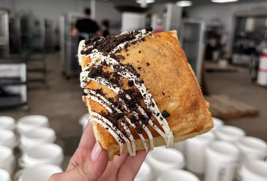 A pastry being held by a hand