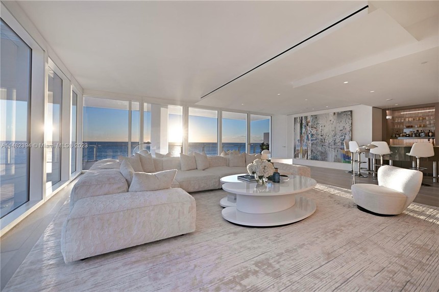 Living room inside a luxury condo overlooking the ocean in Surfside, Florida.