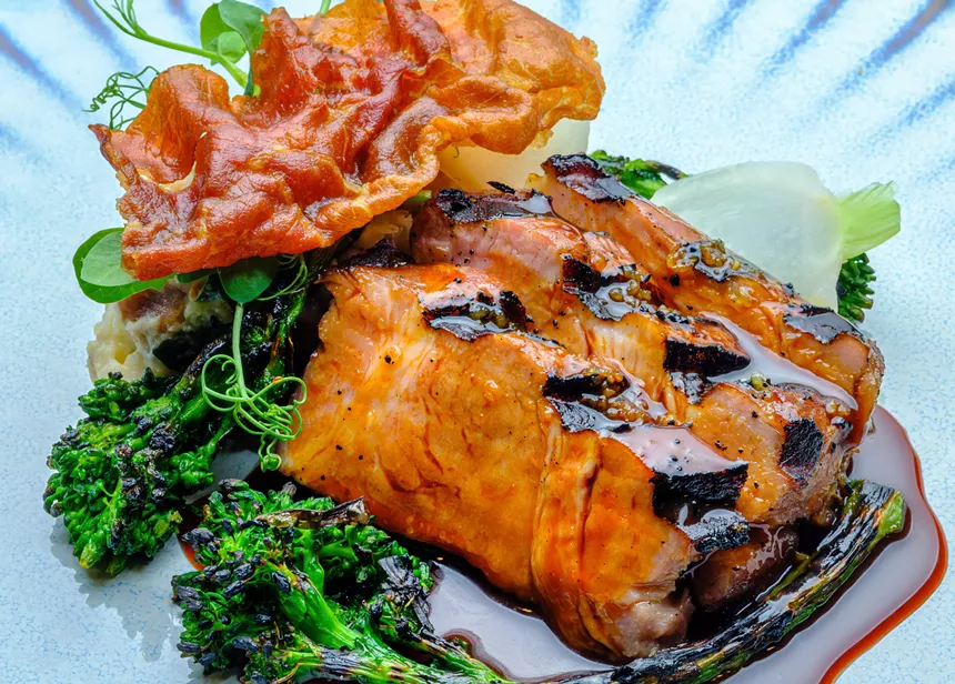 Grilled pork and sauce on a plate