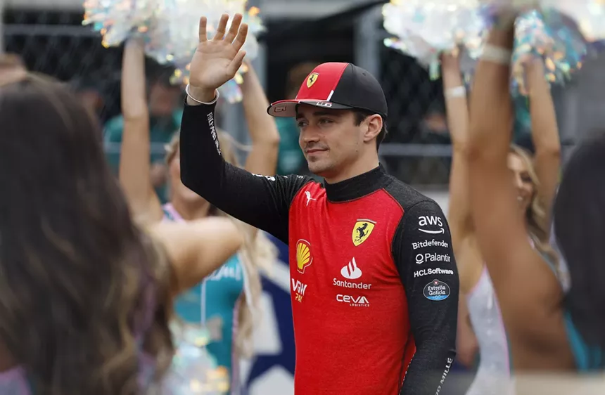 Charles Leclerc waving at fans at the Miami Grand Prix in 2023