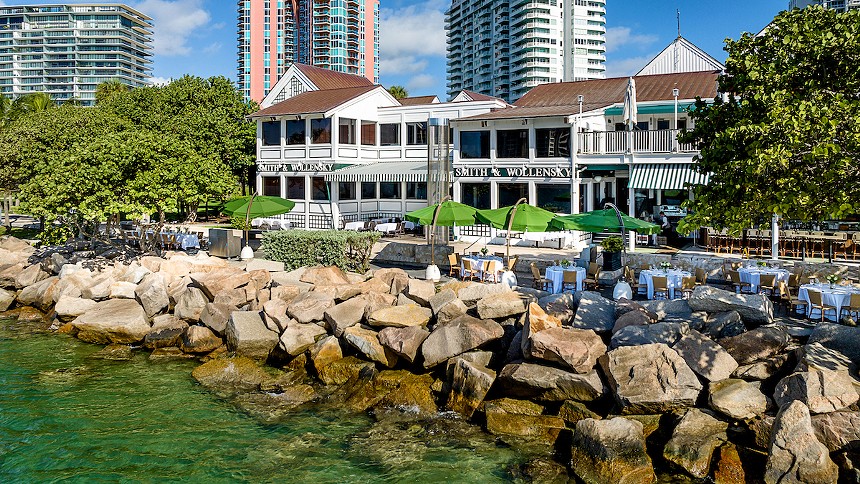 A steakhouse outside by the water