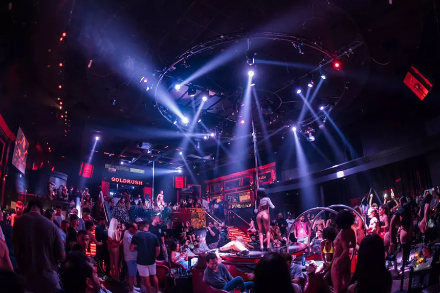 Partygoers and strippers at Gold Rush
