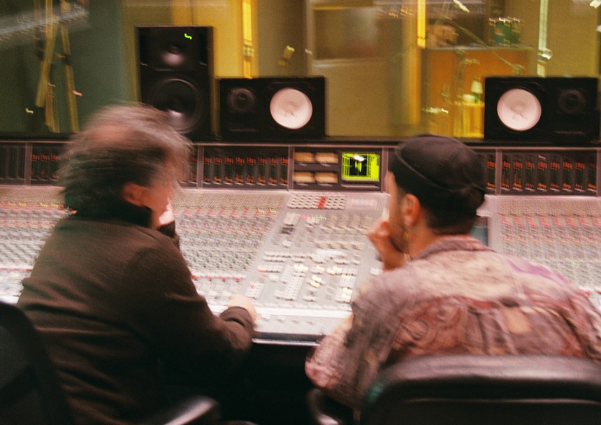Carlos Alvarez and Michael Cantalupo behind the soundboard at Criteria Studios