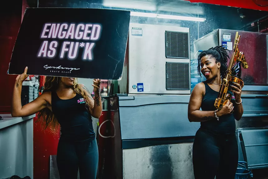 Two women in Michelle Kent's bottle service class