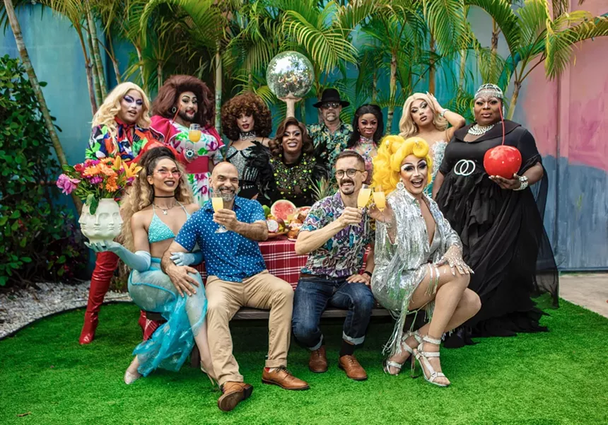 A group of people outside posing for a photo