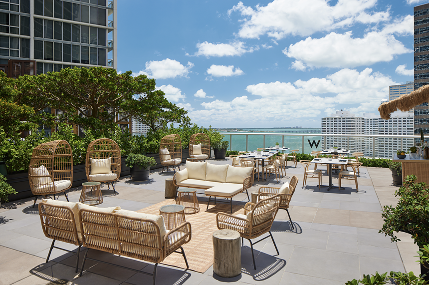 an outdoor patio overlooking the water