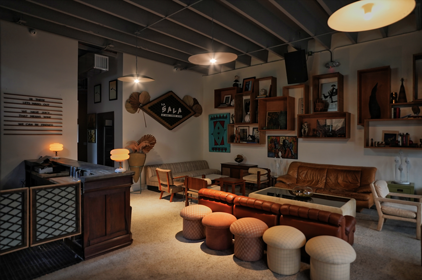 a dining area with leather couches