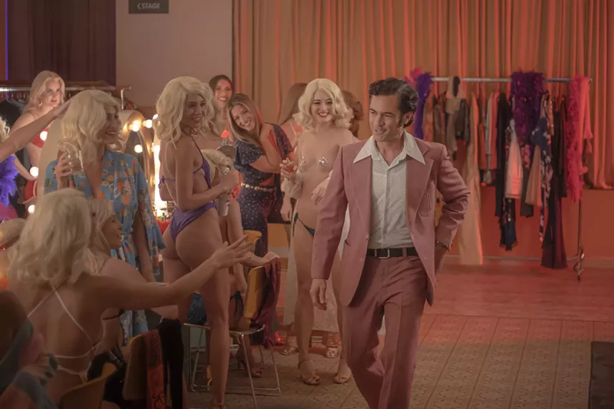 Still of Danny Pino and several women in Hotel Cocaine