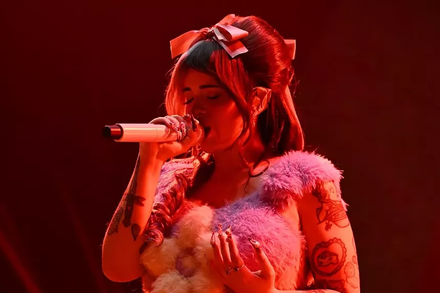 Melanie Martinez on stage at the Amerant Bank Arena