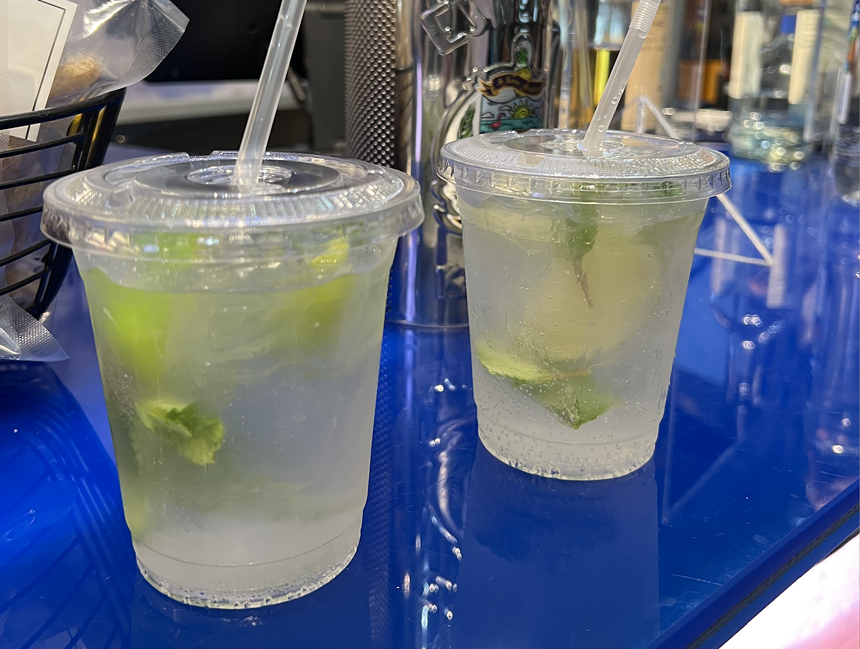 two drinks on a blue table