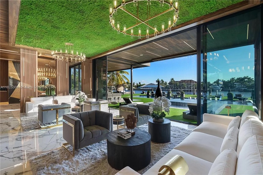 Interior of $48 million mansion in Fort Lauderdale with opening to backyard