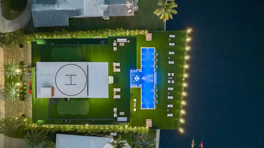 Drone helipad and two putting greens on the top of $48 million mansion.