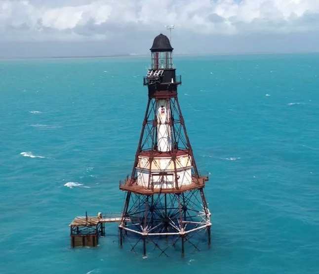 Remote lighthouse several miles offshore of Florida in the Atlantic ocean