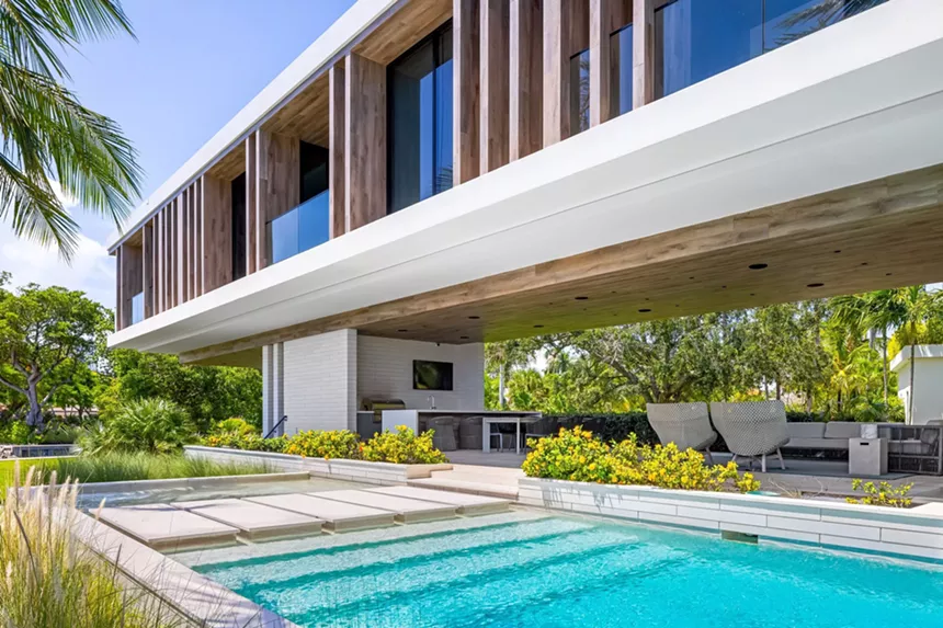 Outdoor kitchen and backyard of $50 million modern mansion