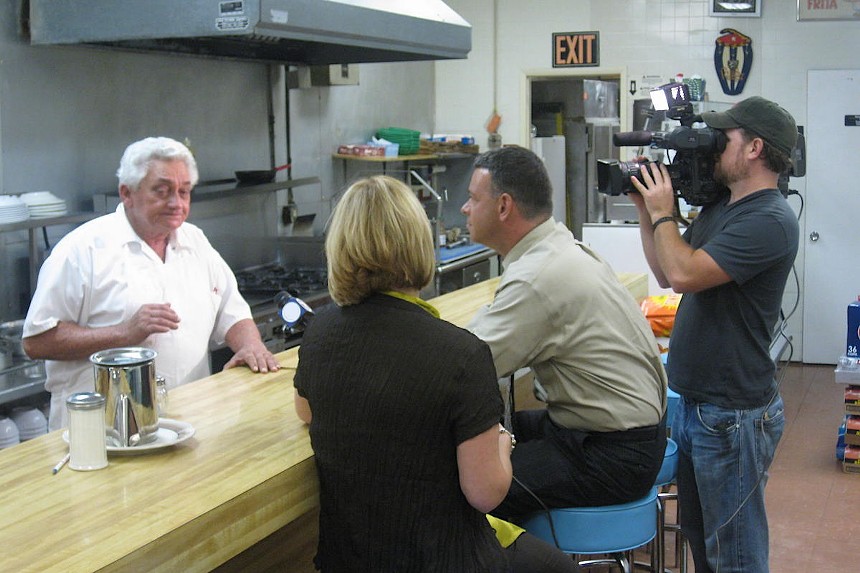 a man speaking on camera