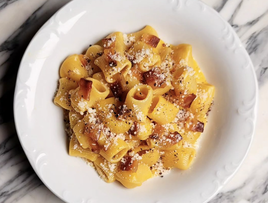 A pasta dish on a white plate