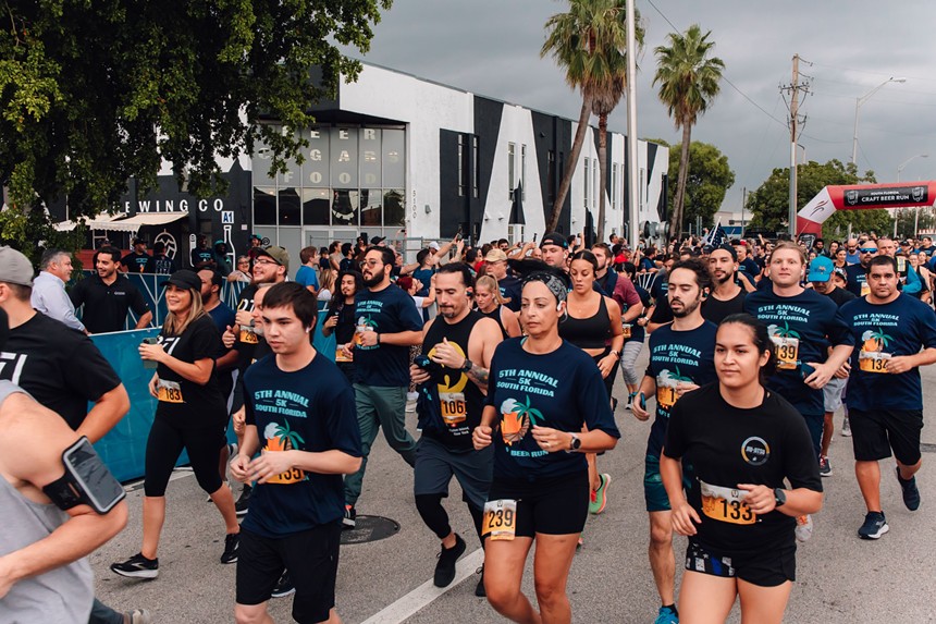 Participants running in the South Florida Craft Beer Run