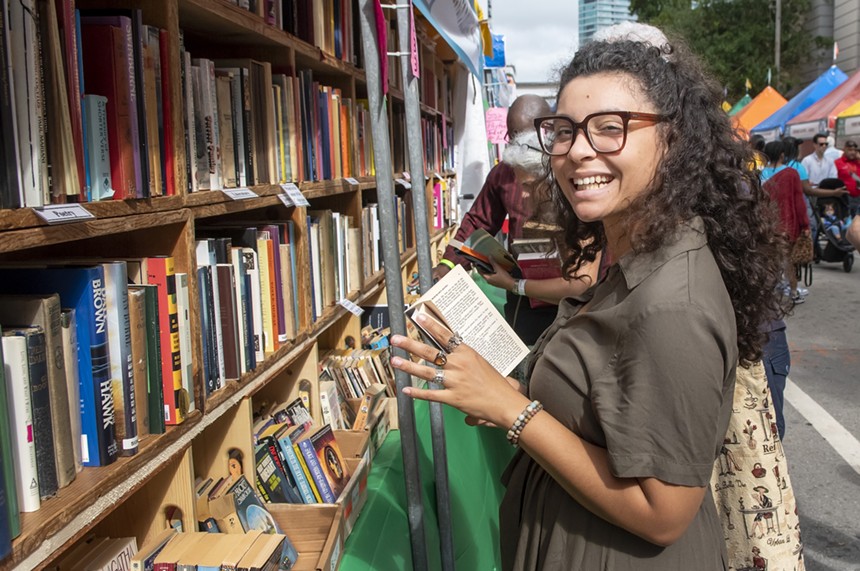 A woman smiling at the Miami Book Fair