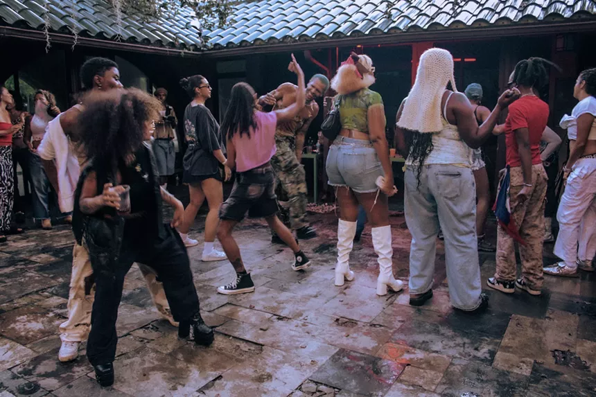 Partygoers at a Masisi event