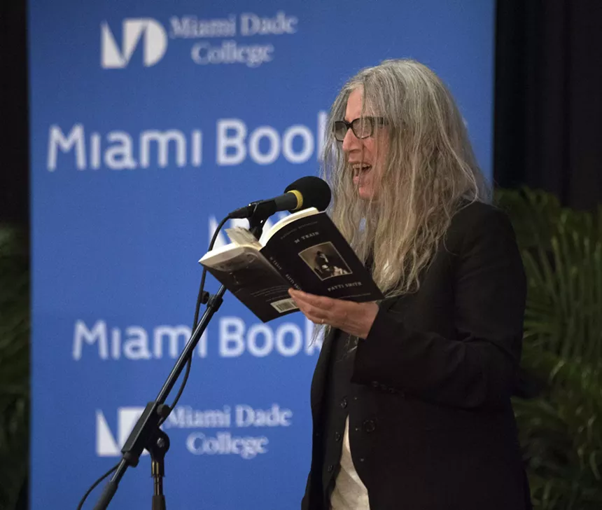 Patti Smith reading a quote from her book M Train at the Miami Book Fair