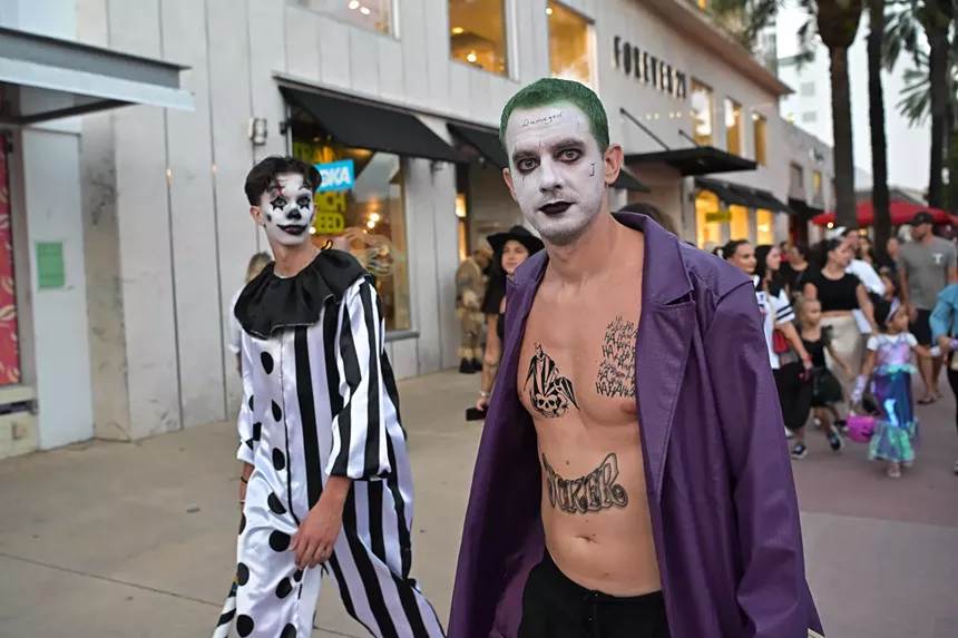 People in costume on Halloween night on Lincoln Road in Miami Beach