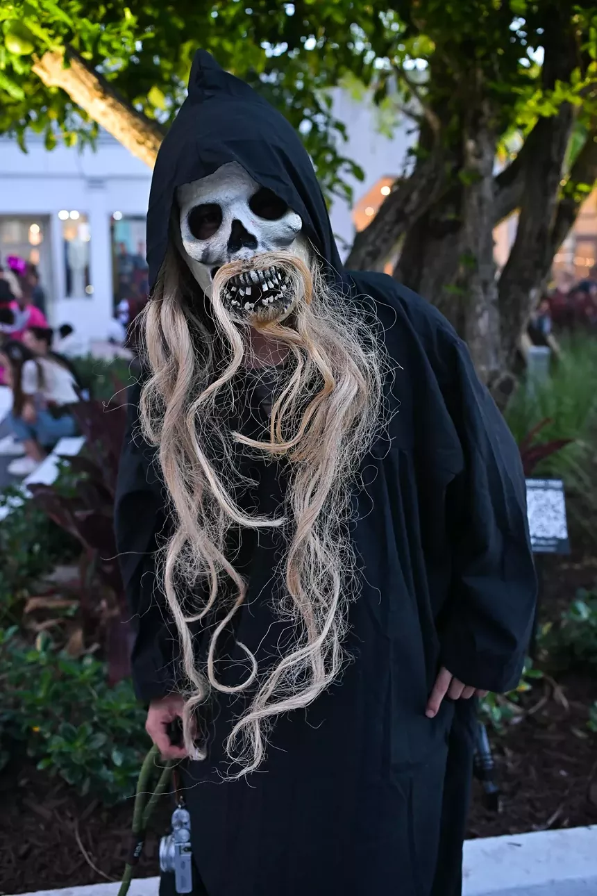 People in costume on Halloween night on Lincoln Road in Miami Beach
