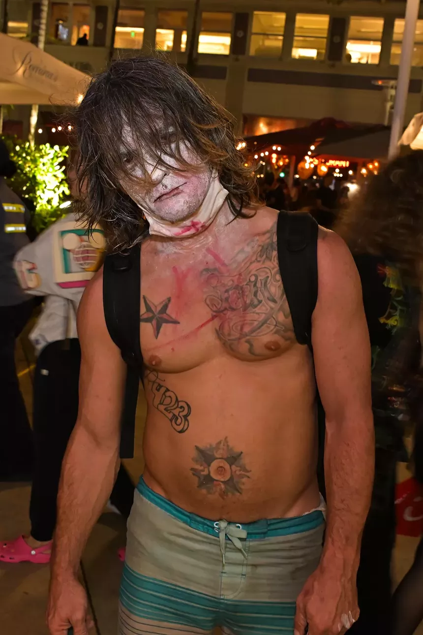 People in costume on Halloween night on Lincoln Road in Miami Beach
