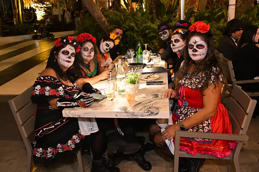 People in costume on Halloween night on Lincoln Road in Miami Beach