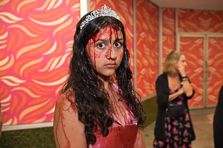 People in costume on Halloween night on Lincoln Road in Miami Beach