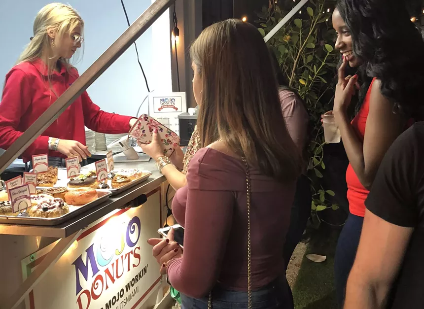people ordering doughhnuts
