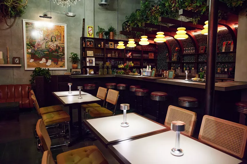 tables and the bar at mangrove