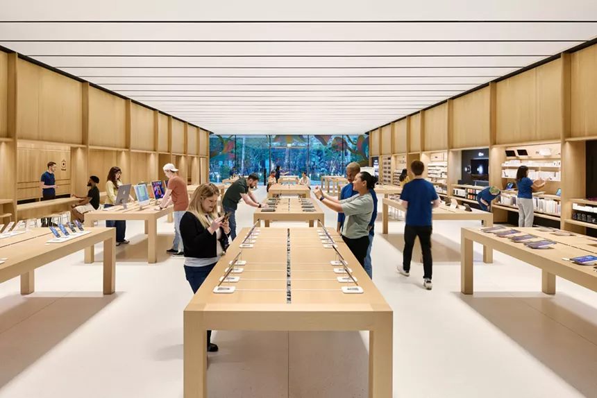 wood and glass interior of Apple store