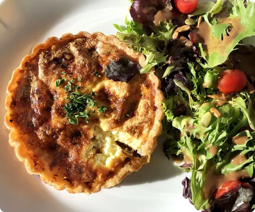 a quiche and salad