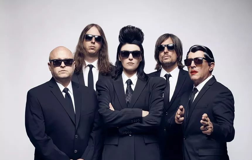 Portrait of the members of Puscifer