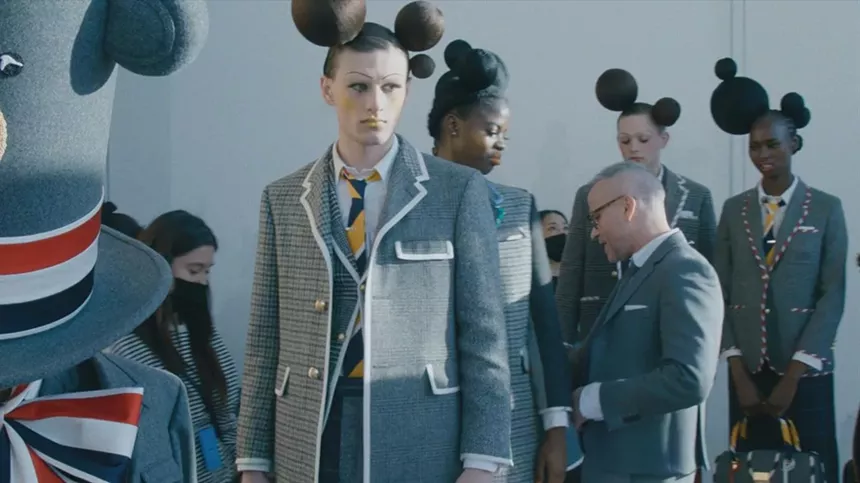 designer Thom Browne preps models for a runway show