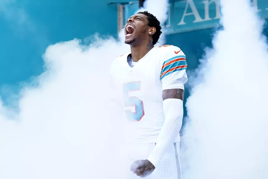 Photo of Jalen Ramsey, in uniform but sans helmet, emerging from clouds from a smoke machine